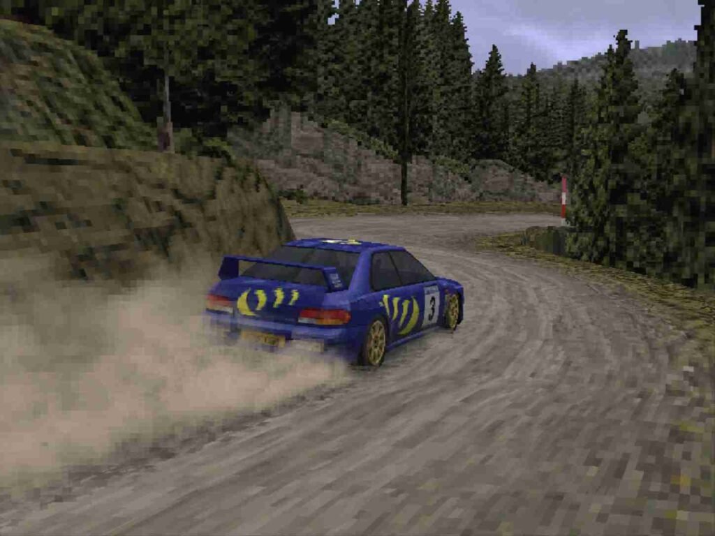 Colin McRae Rally car sliding through a gravel forest stage